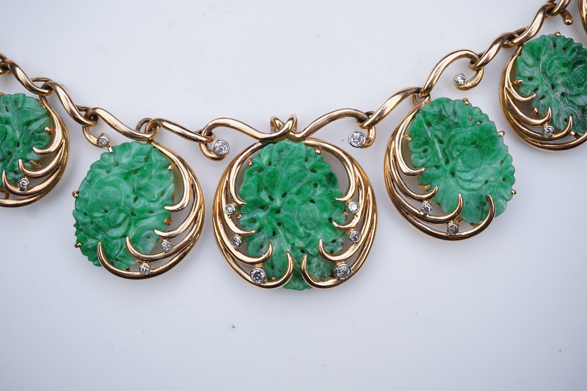 A jadeite and diamond necklace, mid 20th century